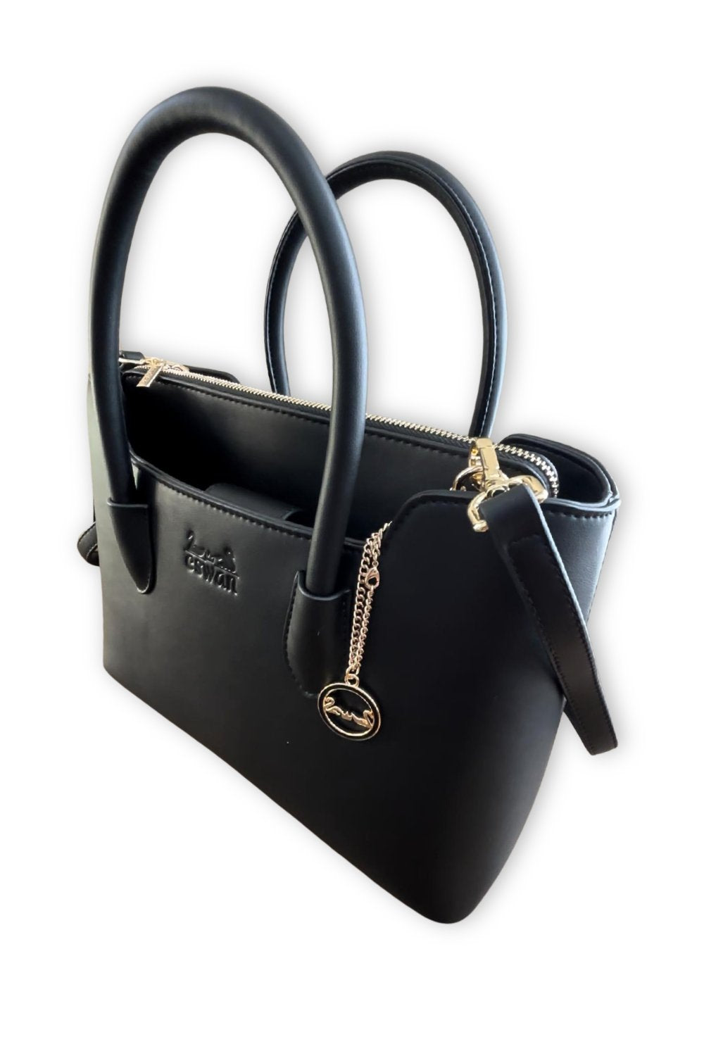 Black CSWAN handbag angled view showing structured shape and gold-tone hardware