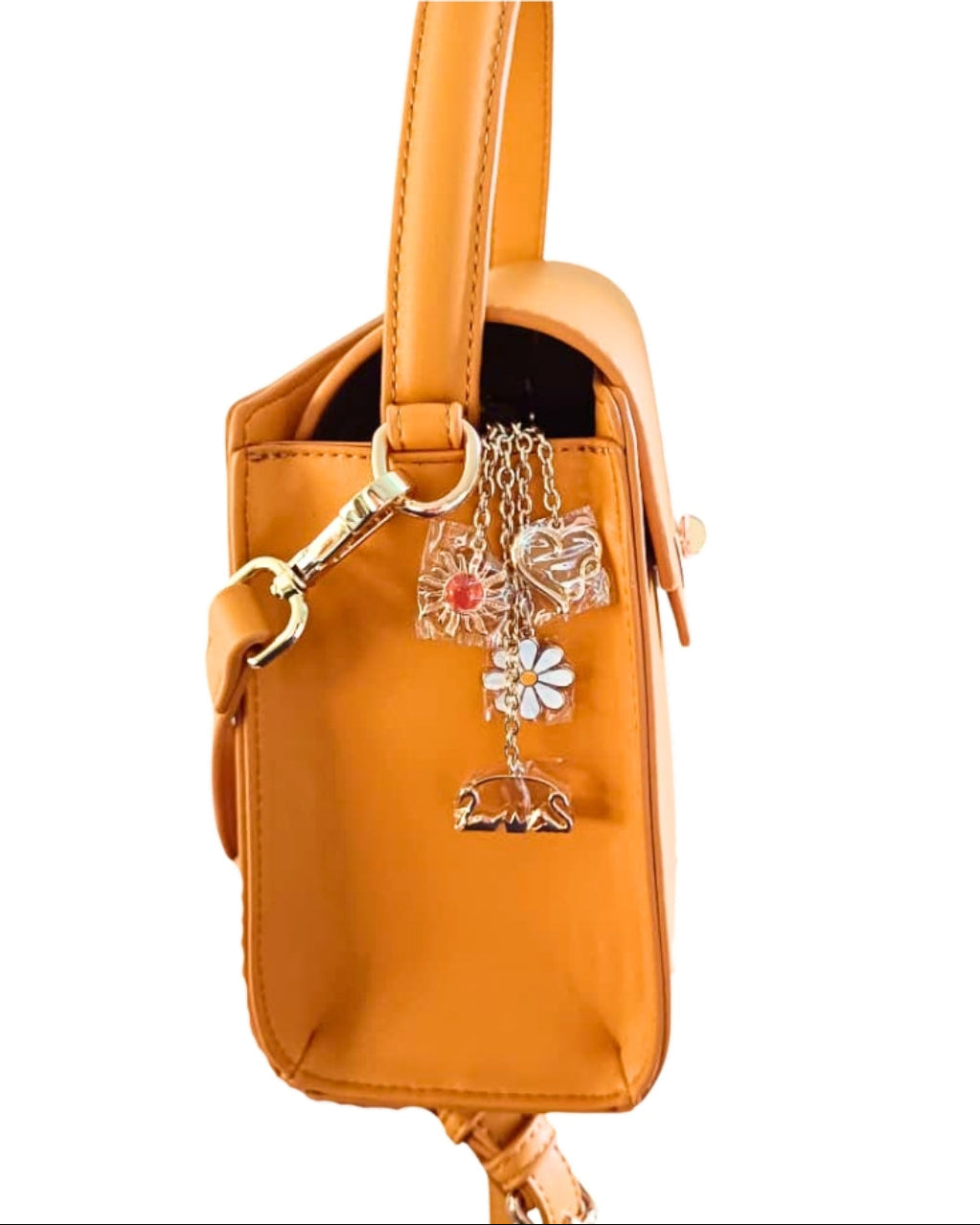 Camel Tundra – CSWAN handbag side view showing shape, depth, and charm detail