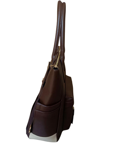Side view of Espresso Brown CSWAN convertible backpack showing exterior storage pocket and structured profile