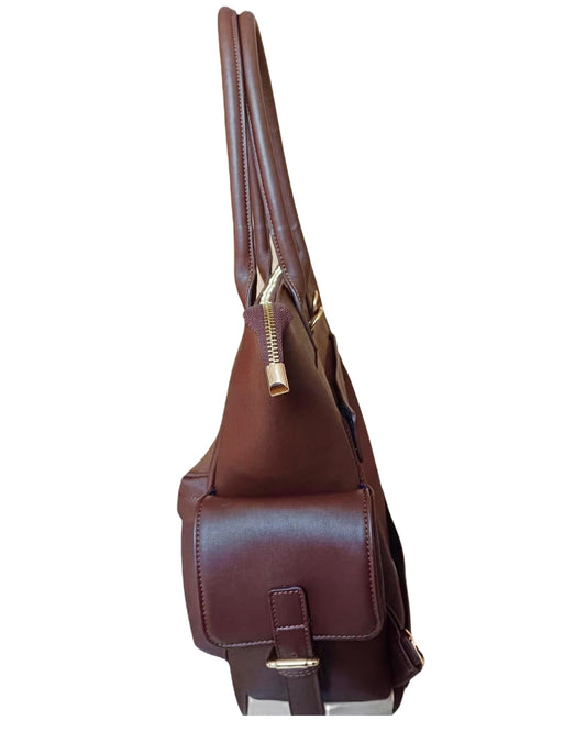 Side view of Espresso Brown CSWAN convertible backpack showing structured profile and exterior storage pocket