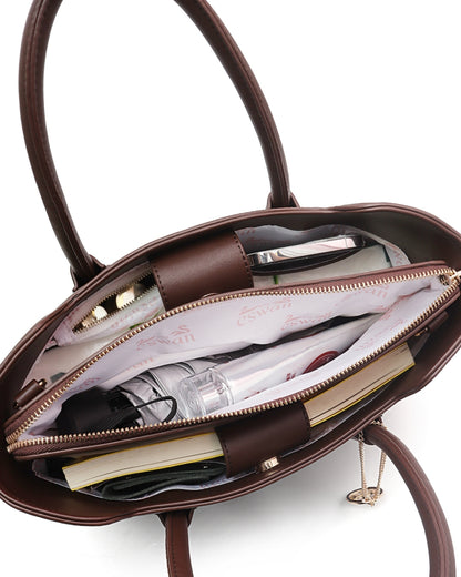 Interior view of Espresso Brown CSWAN medium tote packed with everyday essentials, featuring organized compartments, zip storage, and signature monogram lining
