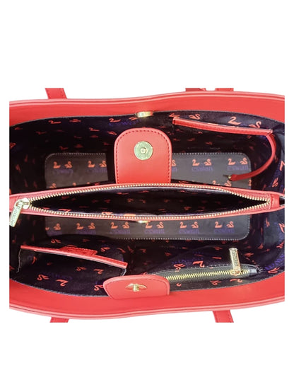 Interior view of Scarlet Trumpeter CSWAN handbag showing structured compartments and signature monogram lining”